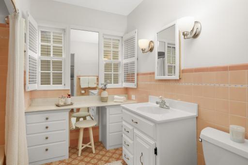 Main floor full tile bath with built in vanity