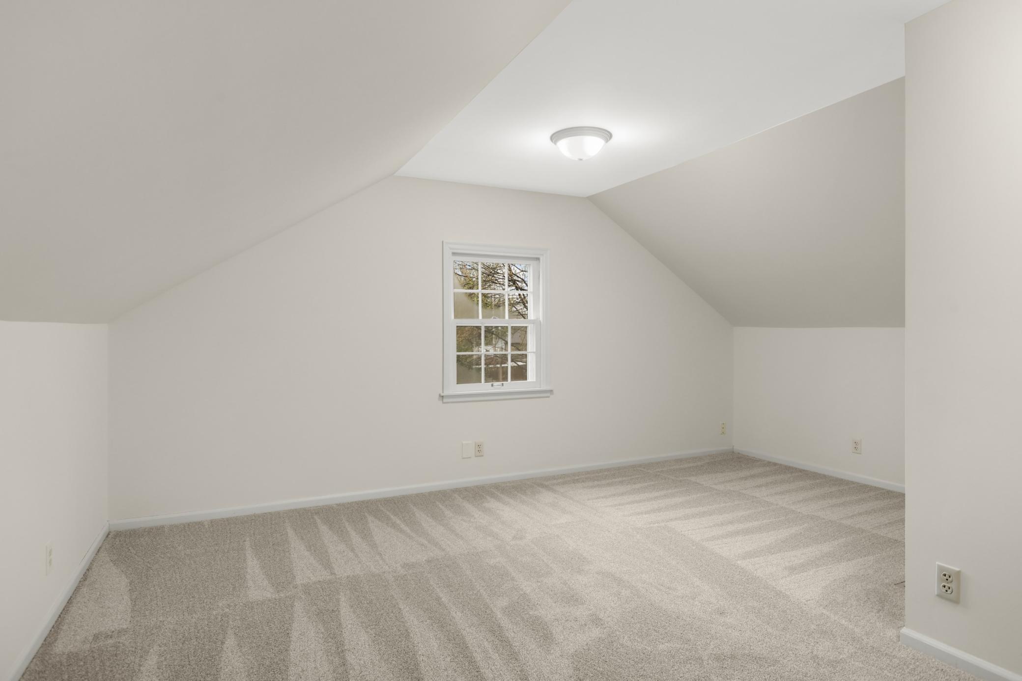 1 of 2 large upper level bedrooms