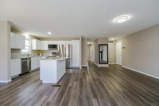 Recently updated 2 Bed/ 2 Bath manor. Home offers an open floor plan, LVP flooring, enameled woodwork, updated light fixtures and fresh paint throughout!