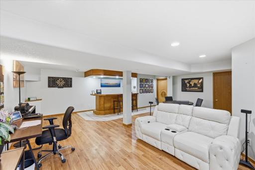 Lower level family room with egress window and built in bar