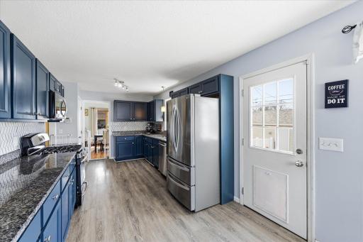Newly updated kitchen with walk out to back yard