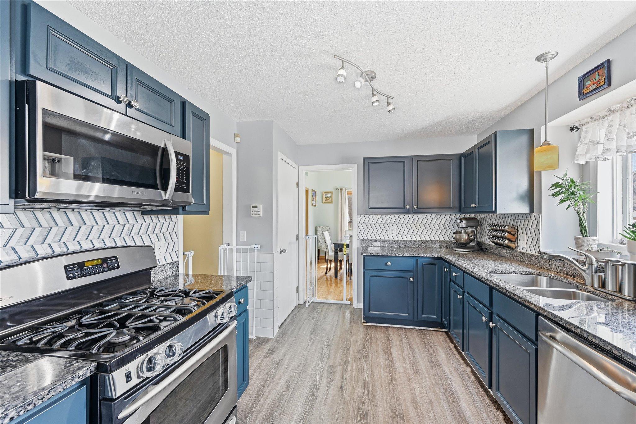 Newly updated kitchen with stainless appliances