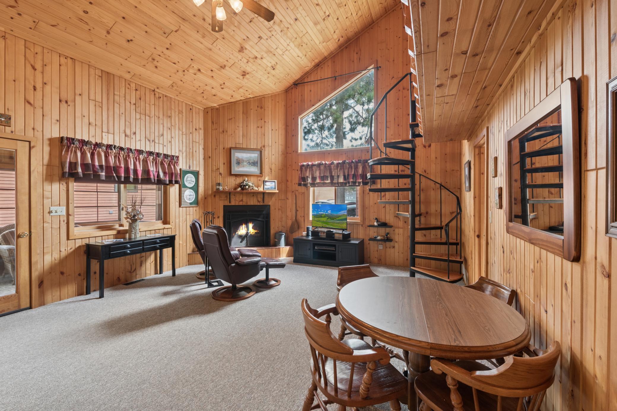 Open main area with wood fireplace.