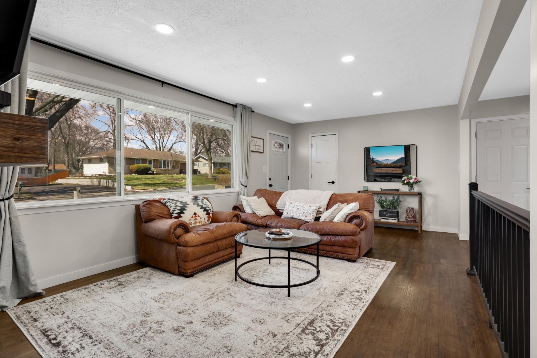 Large living room flooded with natural light