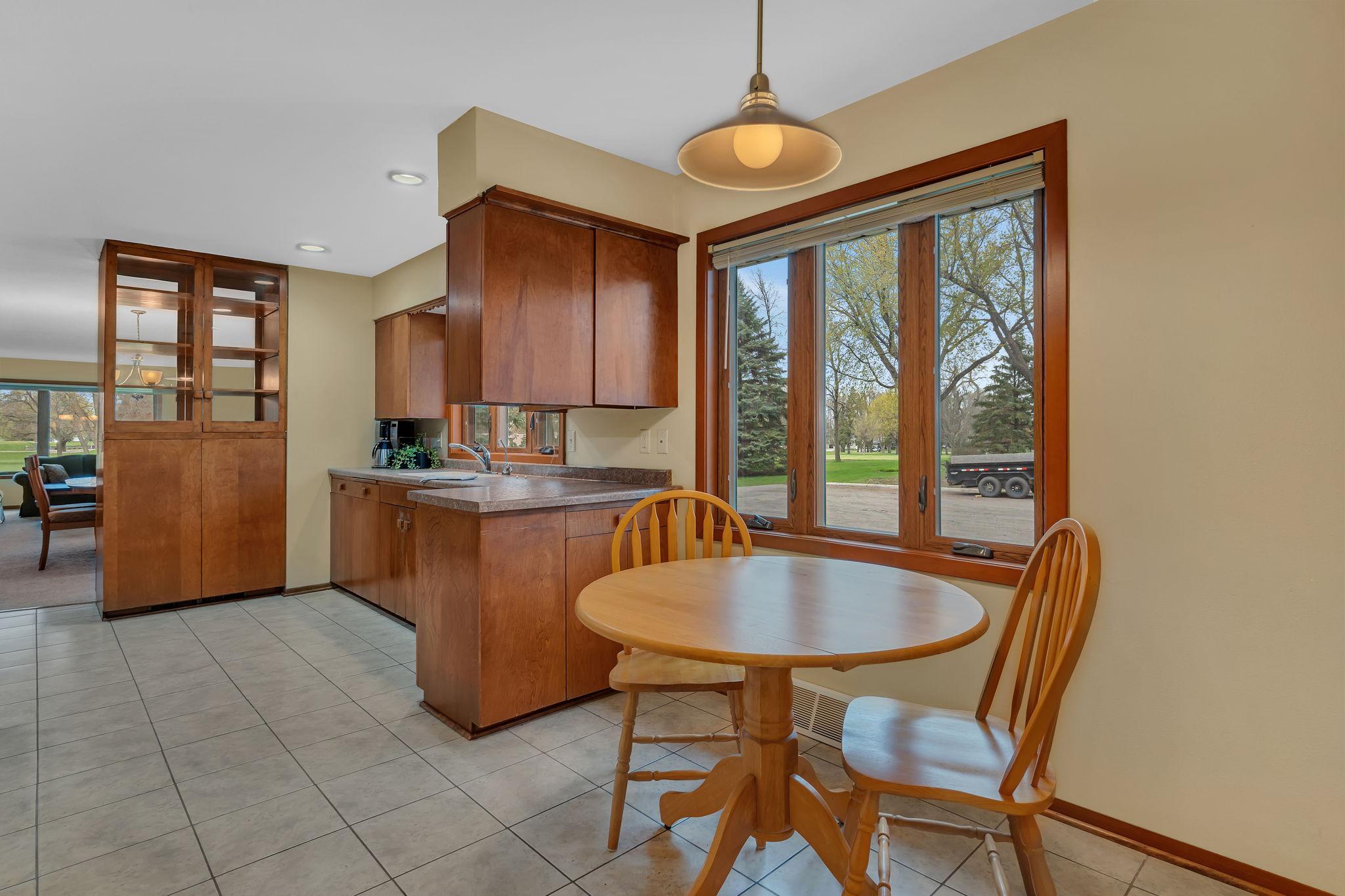 Ample space for a larger table and chairs in the eat-in kitchen