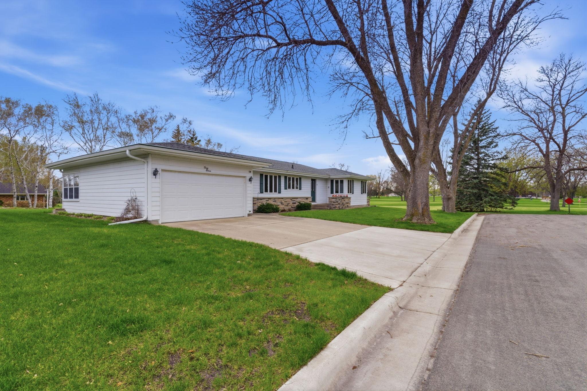 Located at the end of Oak Ave overlooking the hitting & chipping range along the #8 fairway