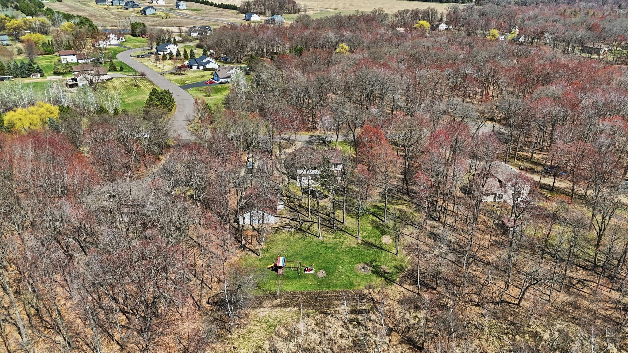 Aerial view - mix of wood and lawn