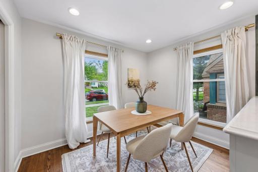 Filled with natural light, the dining area opens directly to the kitchen, making it perfect for both casual meals and effortless entertaining.