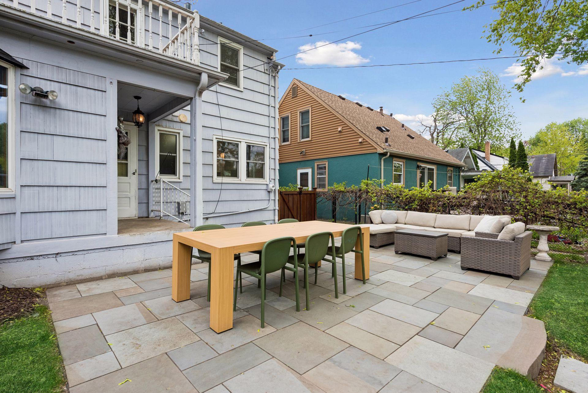 A beautiful New York bluestone paver patio provides the perfect setting to enjoy peaceful early mornings or relaxing late summer evenings.