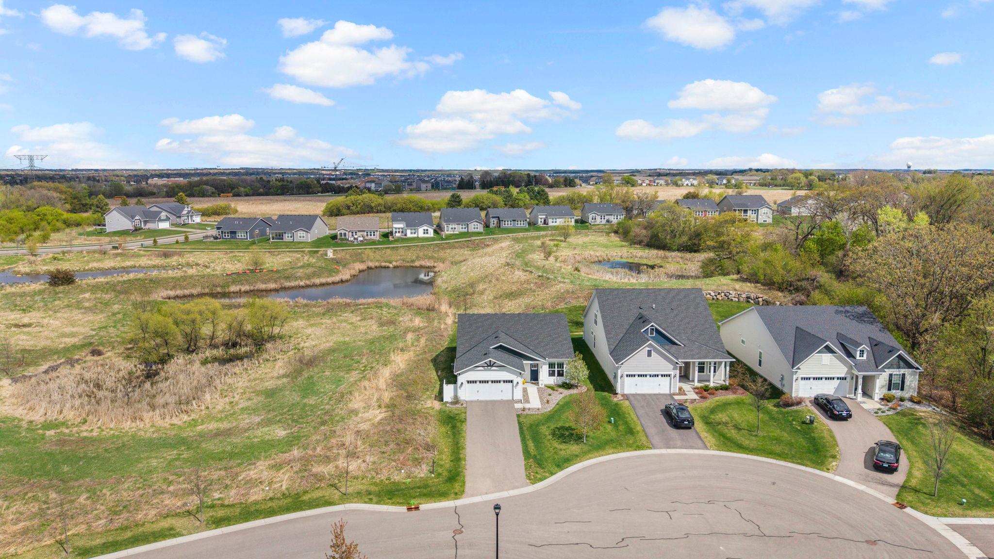 Located on a quiet cul-de-sac with open wetlands on one side, this property offers a private setting surrounded by natural beauty