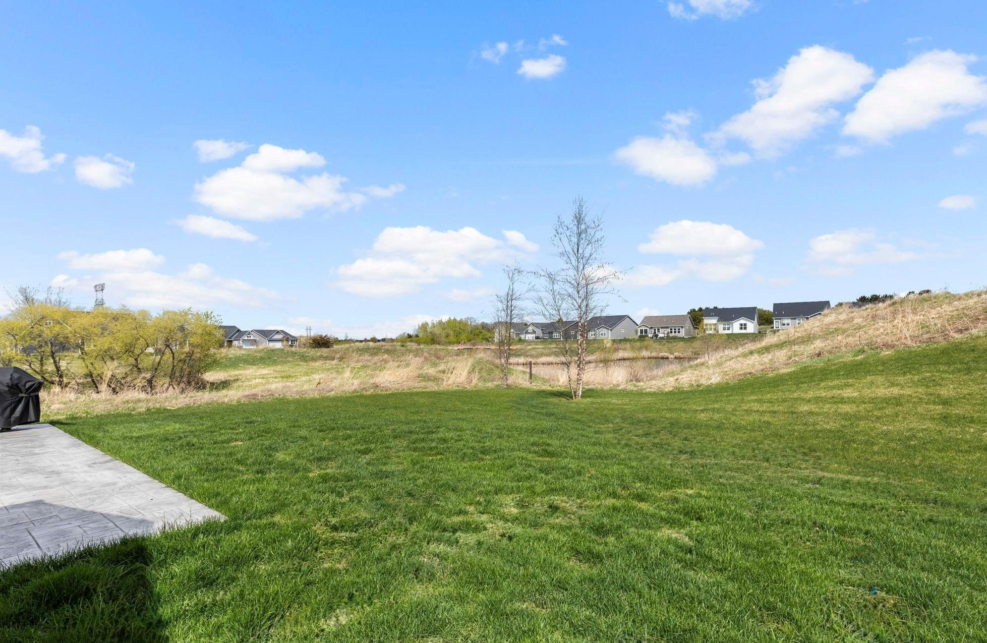 The patio provides beautiful views of the wetlands, creating a perfect setting to relax and enjoy nature