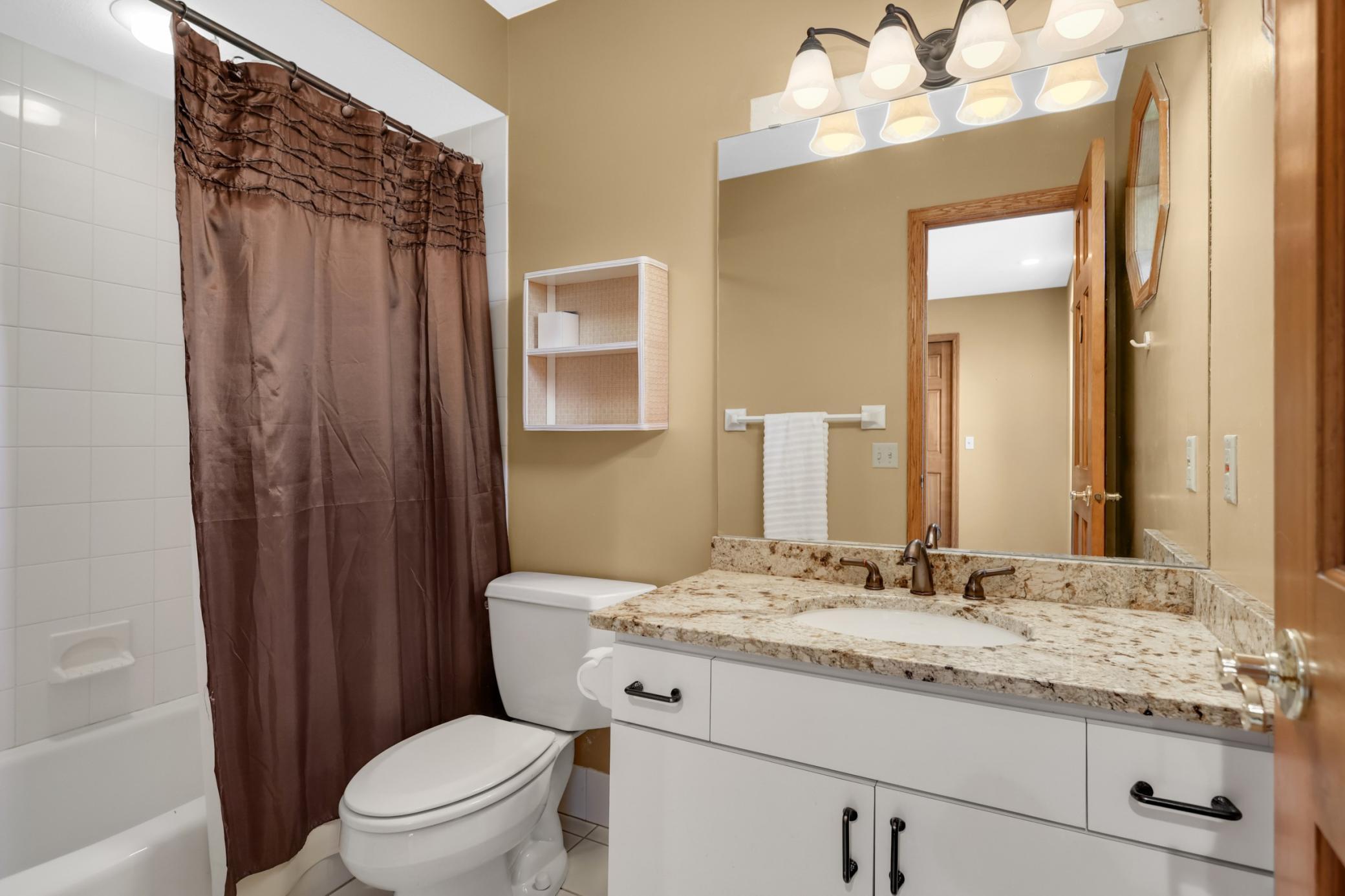 Private full bath in 2nd main floor bedroom. Updated and in immaculate condition!
