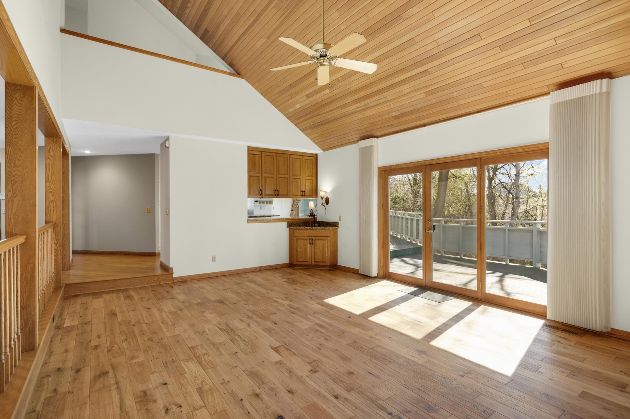 Main floor family room will be your favorite spot in the home! Abundant natural light, wood floors, view into the kitchen area, and upper level loft above this room. Move in and enjoy this gorgeous home!