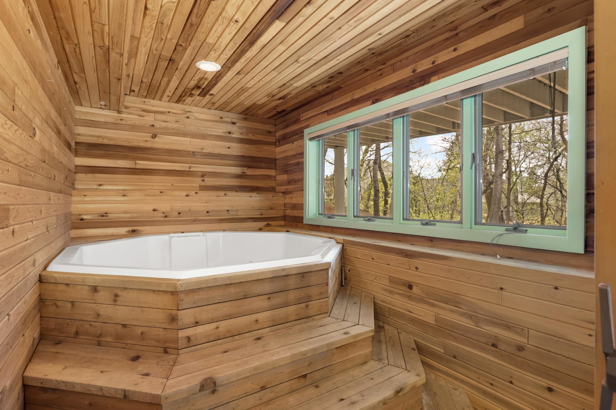 Hot tub room! Owners have not used in years, but when they did enjoy this space it was a perfect spot to relax and unwind. It was serviced after it was last used.