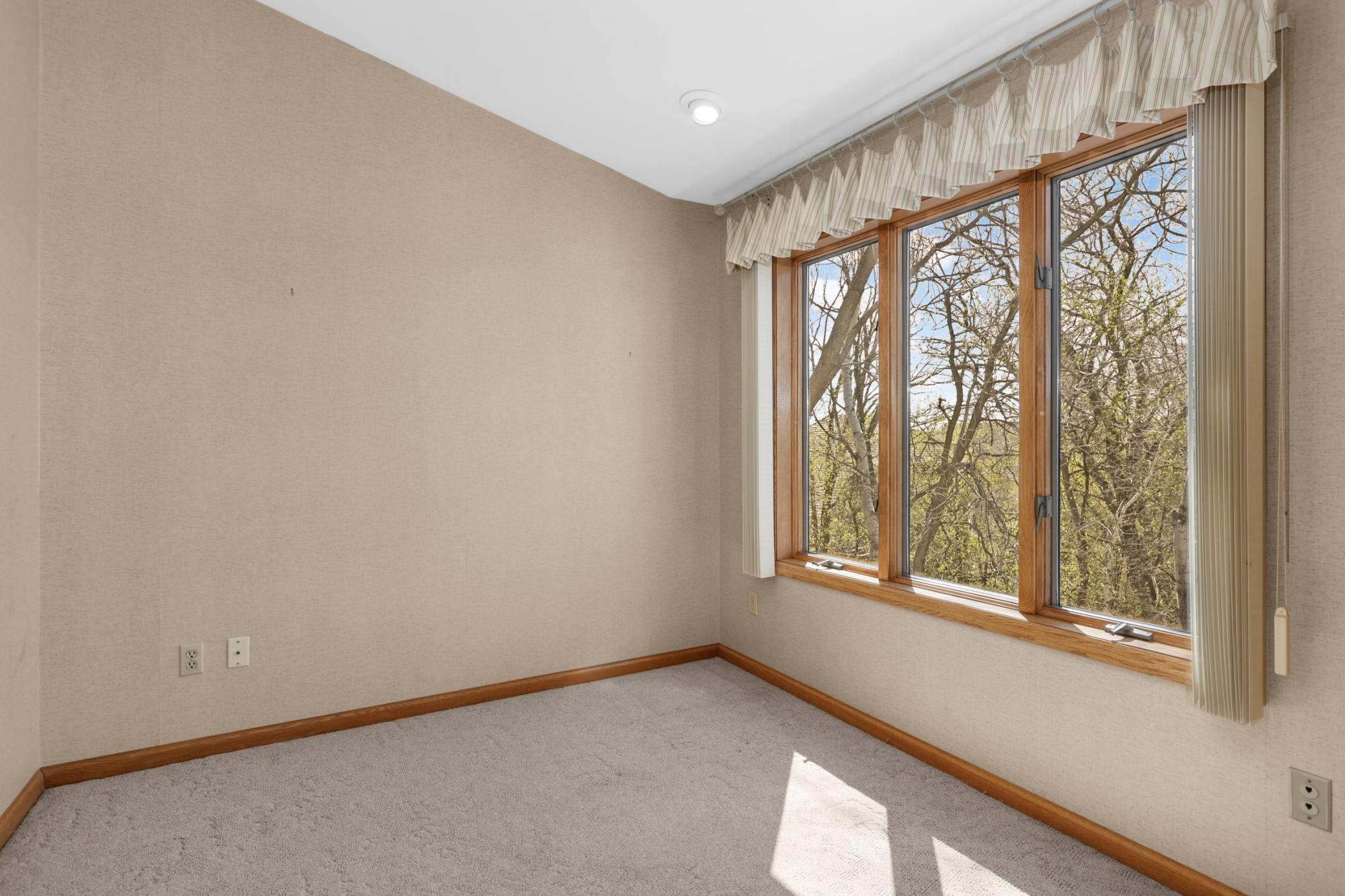 Upper level office/den area. Imagine working from home in this tucked away spot with the sunlight pouring in! A great reading nook, office, play space or craft room.