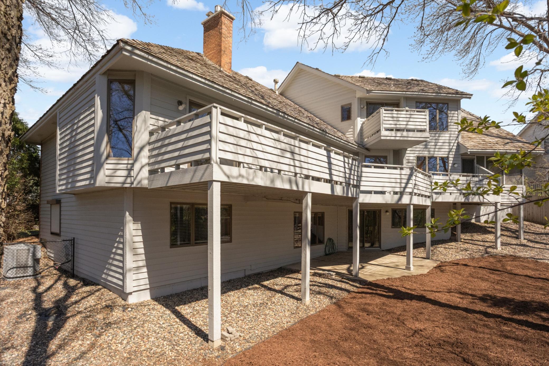 Outdoor living at this home is impressive! Imagine summer mornings or evenings on this expansive deck that runs the length of the home! Maintenance free decking. A cute deck is attached to the upper level loft area as well. Lower level patio!