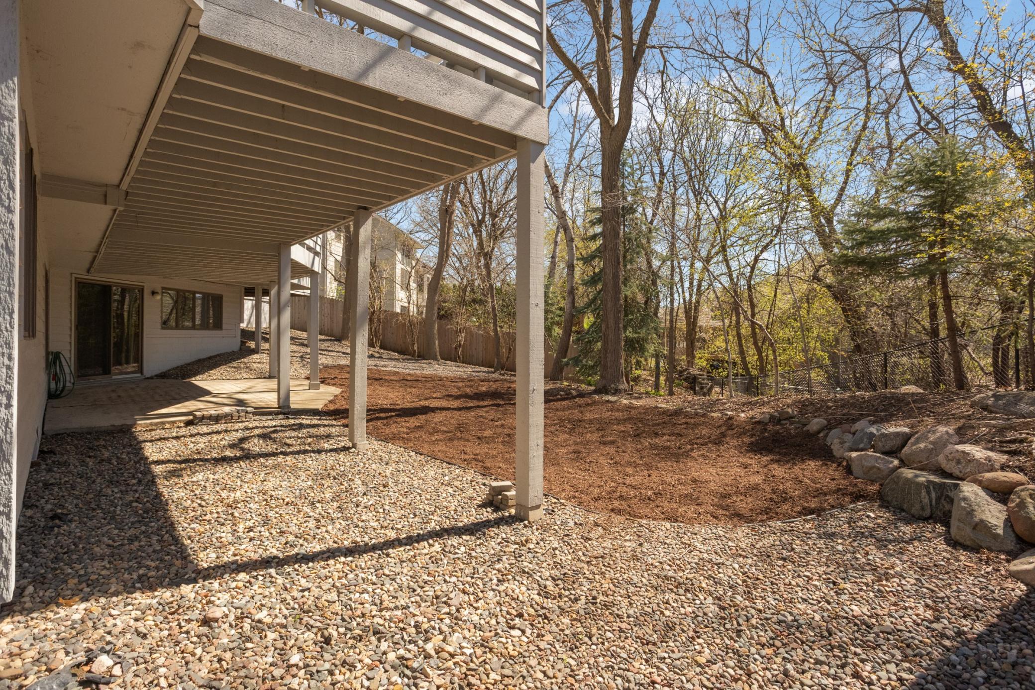 Backyard area. Beautiful private yard space is fenced. This would be a perfect spot for future fire pit or larger paver patio.