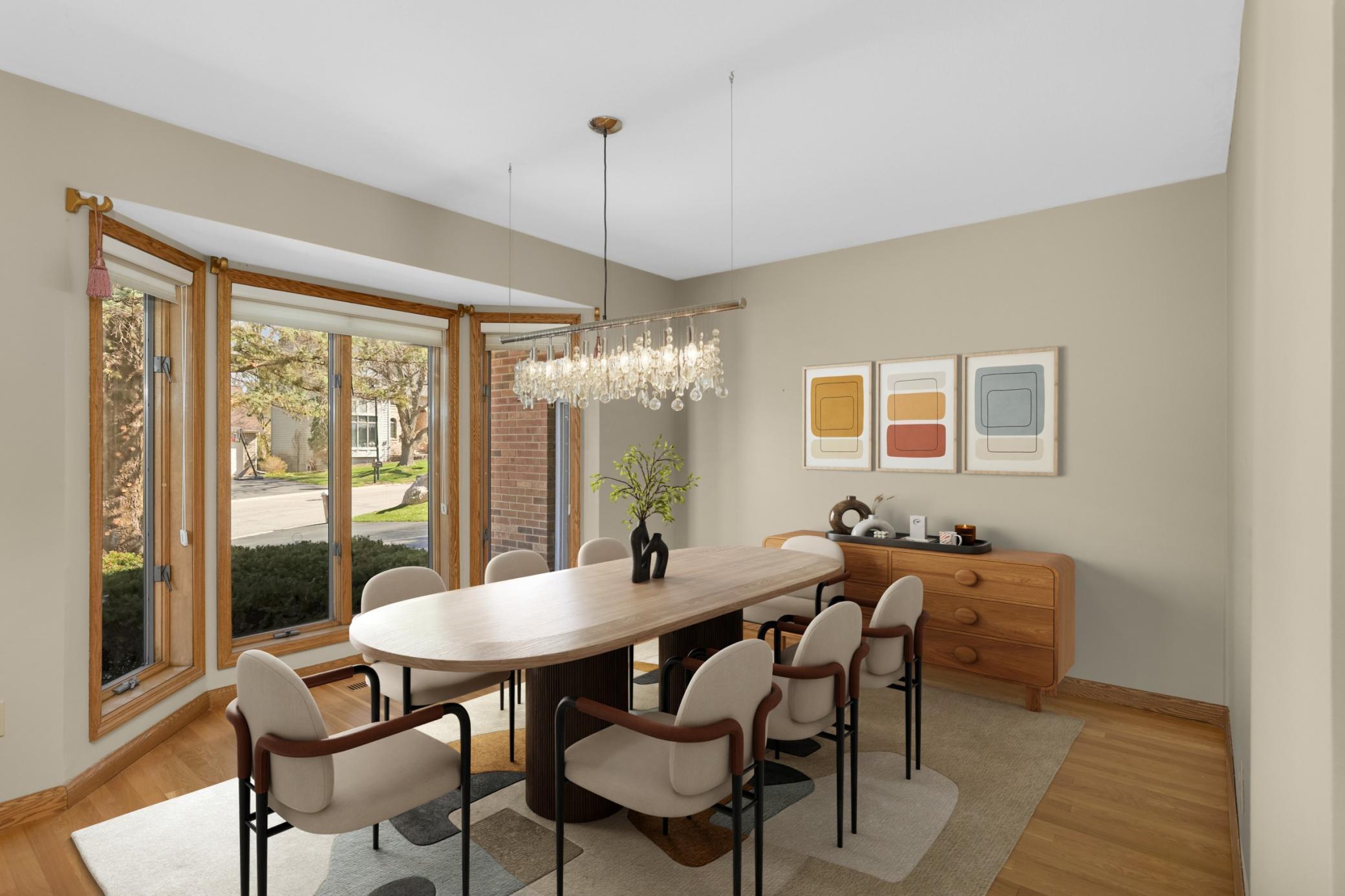 Virtual Staged dining room. Spacious enough for large furniture if desired.