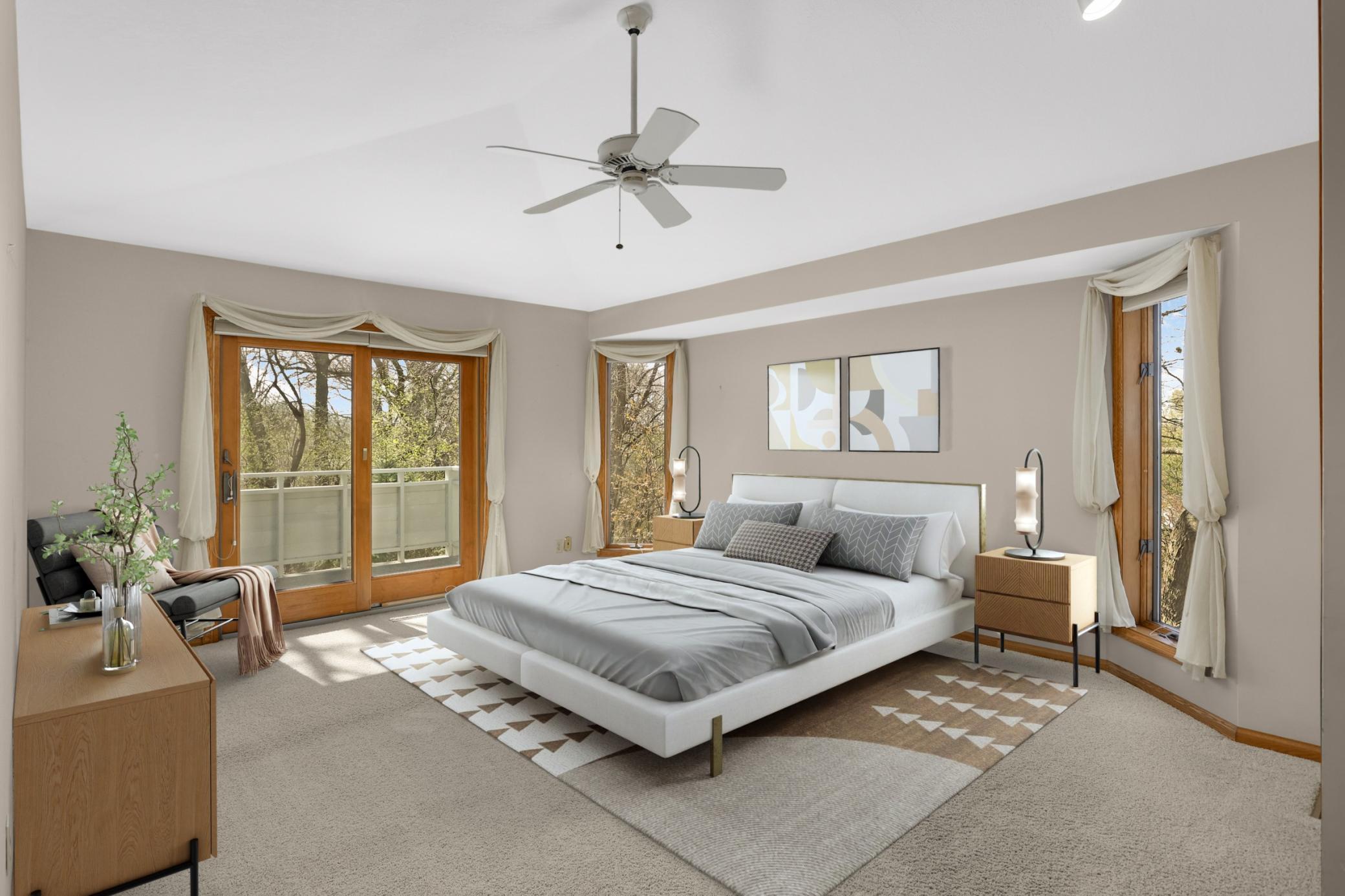 Virtual Staged Primary Bedroom is on the main level. 2 bedrooms on main level, 2 additional bedrooms in lower. Home lives like a rambler with a bonus loft on 2nd floor. Sliding doors lead to deck. Private spa-like bath and 2 closets!