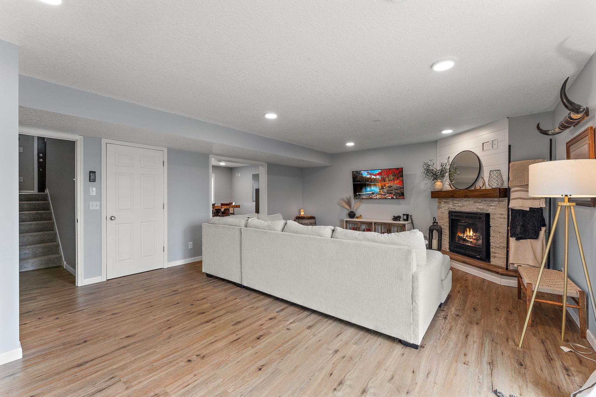 Open concept on both floors, room to add your dry bar and microwave space along the patio door wall, complete with counter height outlets added.