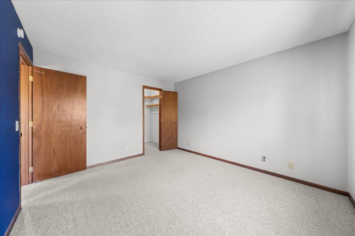 Primary Bedroom with walk-in closet