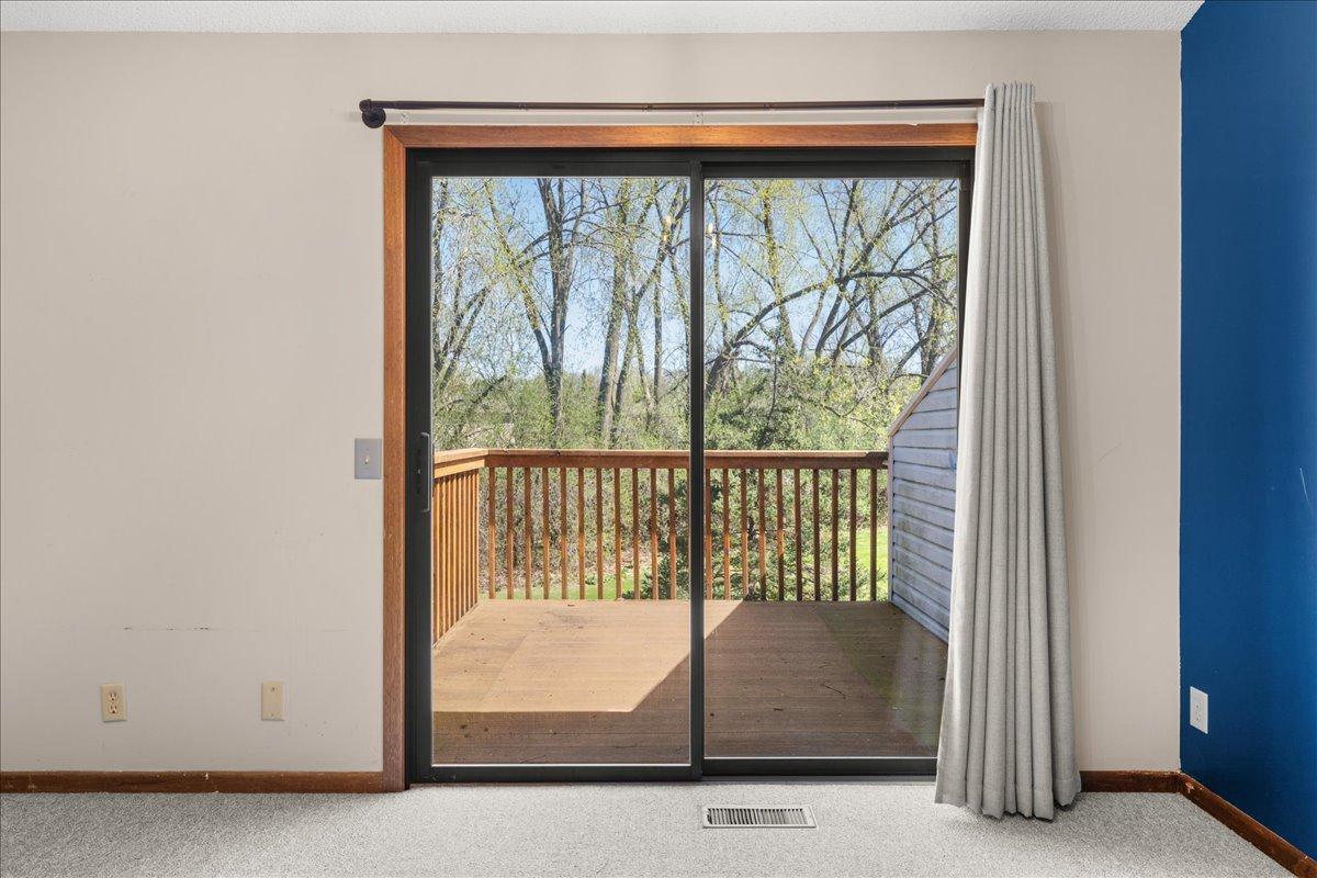 Deck overlooks back yard