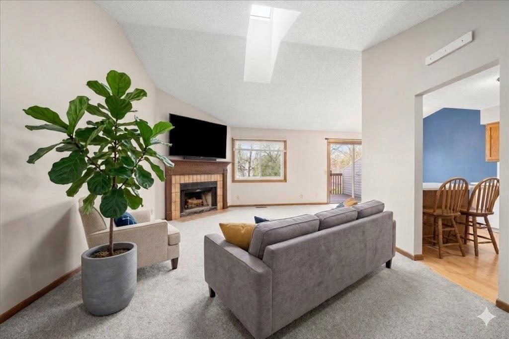 Living Room with skylight (virtually staged)