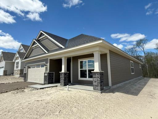 Welcoming front porch will offer up morning sunrise views.