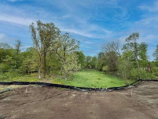 This home has private wooded and wetland views.