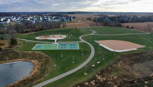 Imagine all the memories you will make with friends and family enjoying the community pool! Lakeshore Park offers walking trails to the new city park which features pickleball courts, sledding hill, playground and ball fields.