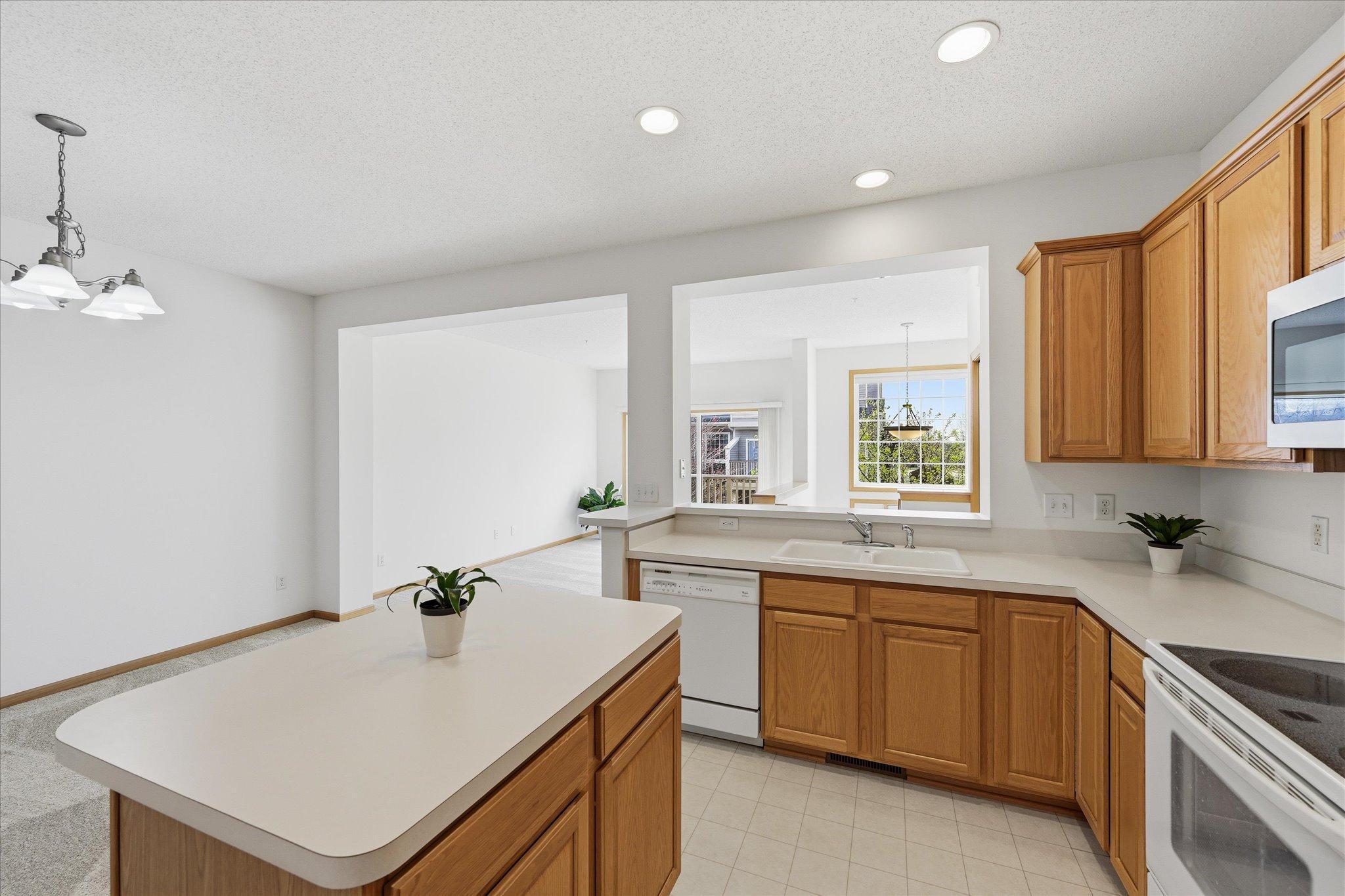 Nice pass through to open up views to the living area!