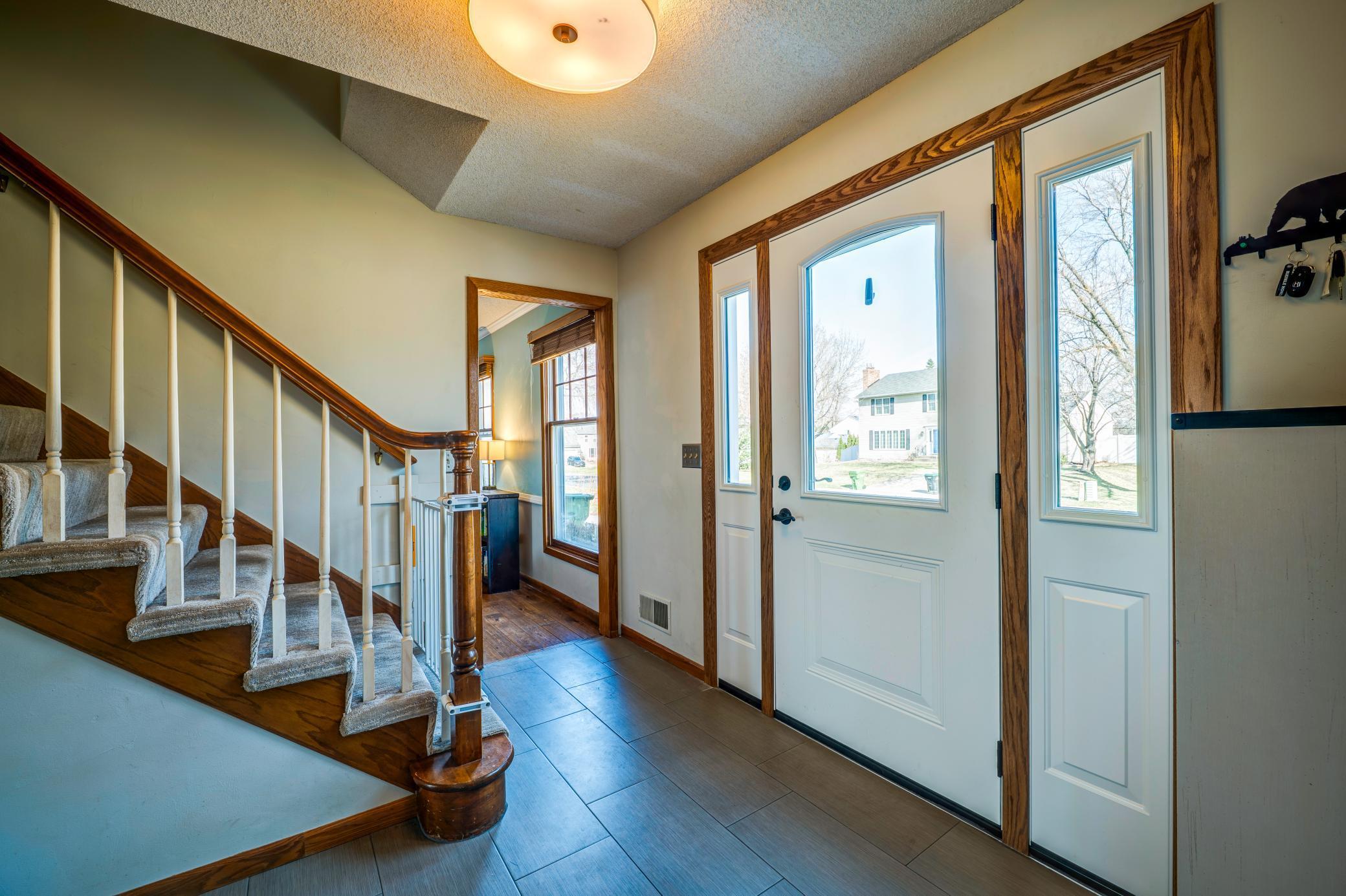 Entrance is large with the family room to the right and living room to the left. Walk straight through to the kitchen