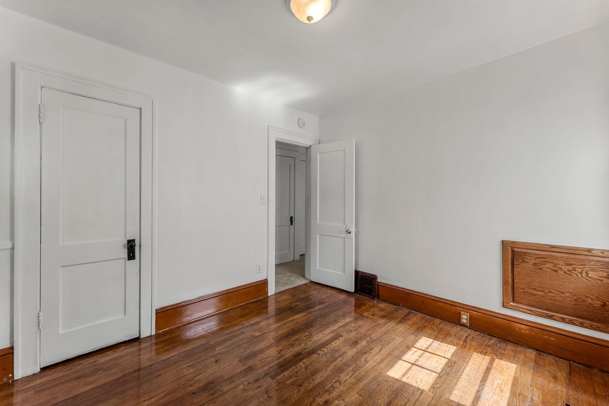 Larger Main Level Bedroom Looking Into Hallway