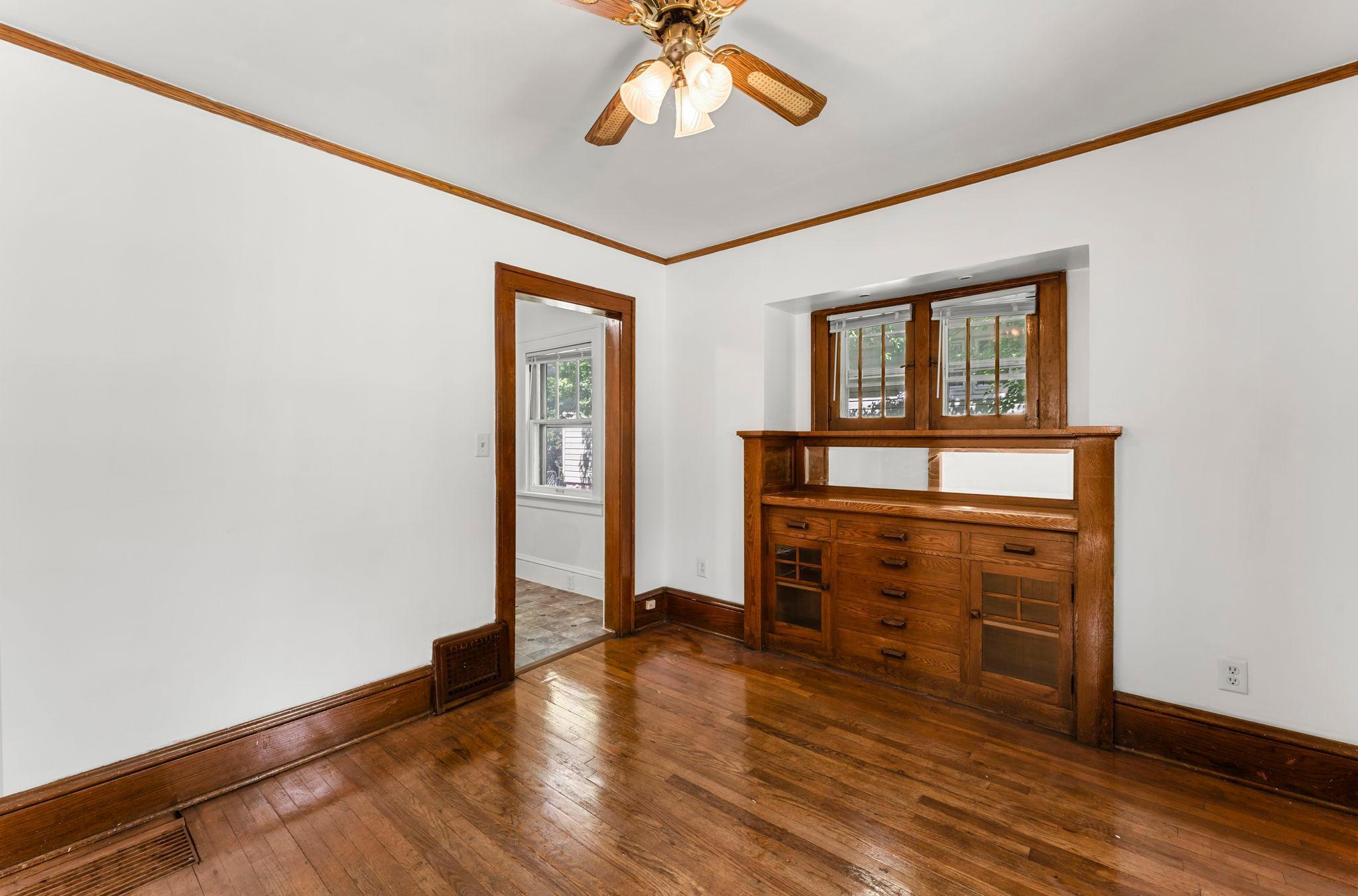 Dining Room With Beautiful Natural Woodwork. The Built In Buffet Has So Much Charm!