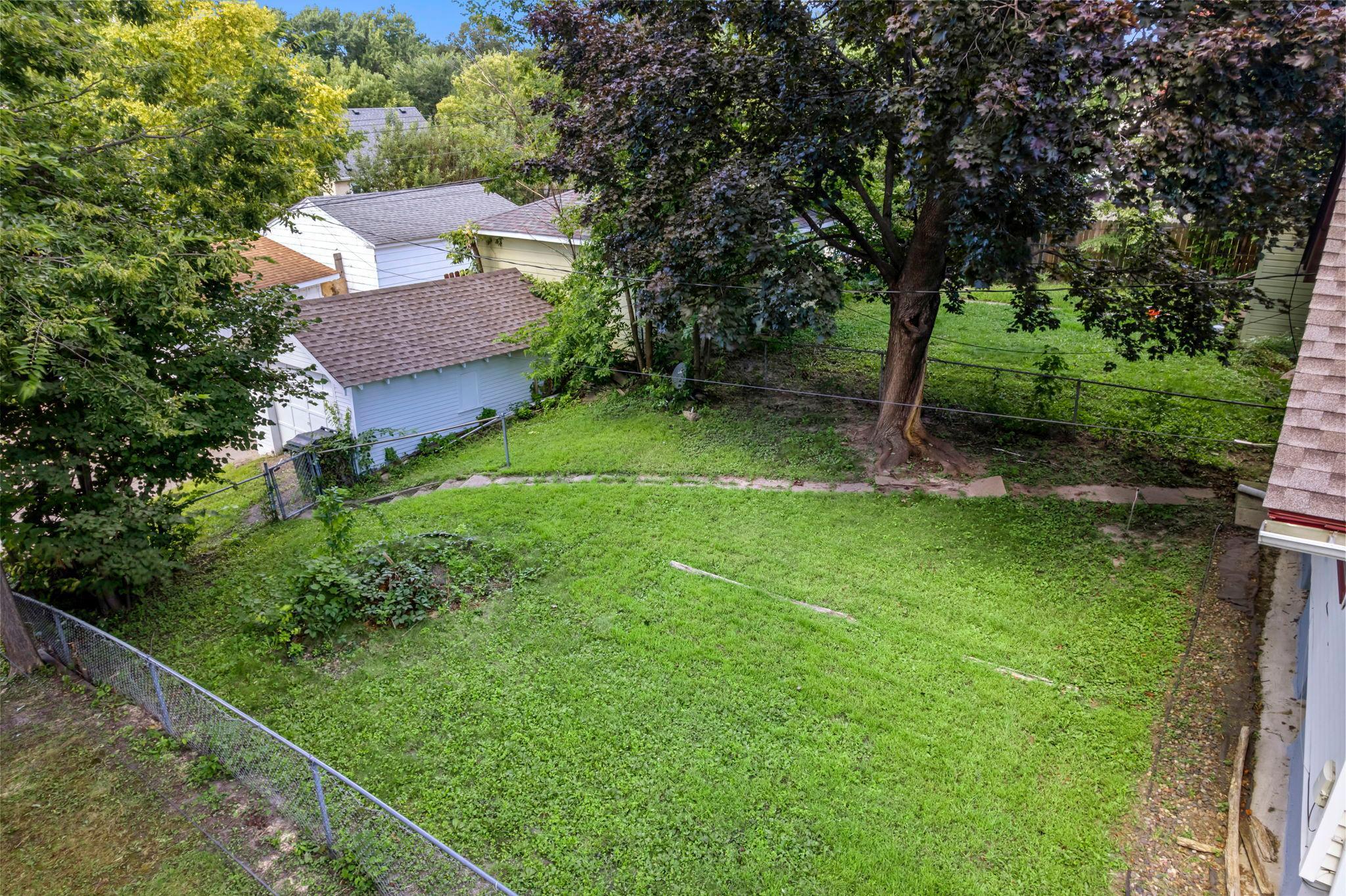 Backyard Going to Garage and Back Alley