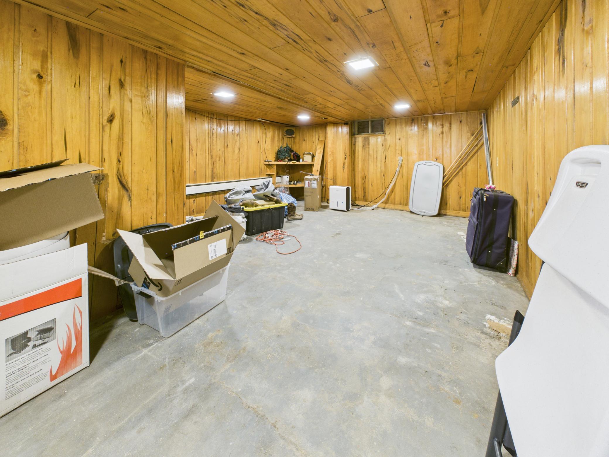 Bonus room area / man cave / game room / finished storage room area downstairs!