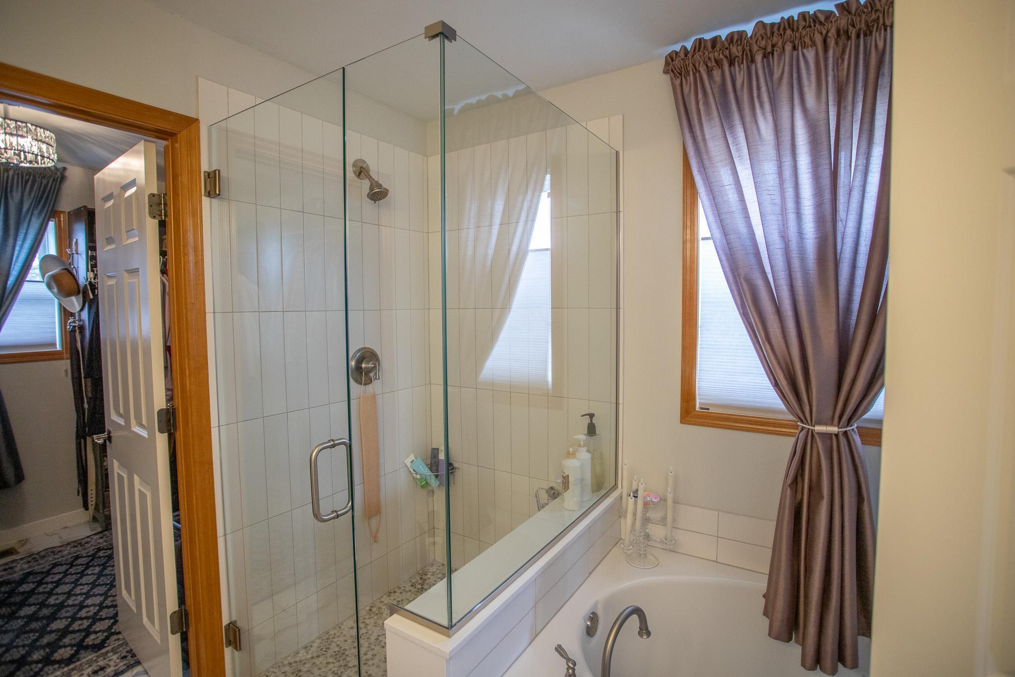 Primary bath with separate tub and shower and double vanity