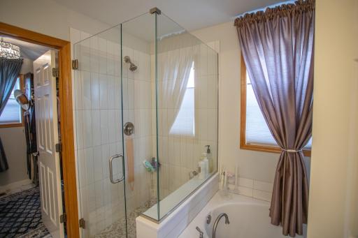 Primary bath with separate tub and shower and double vanity