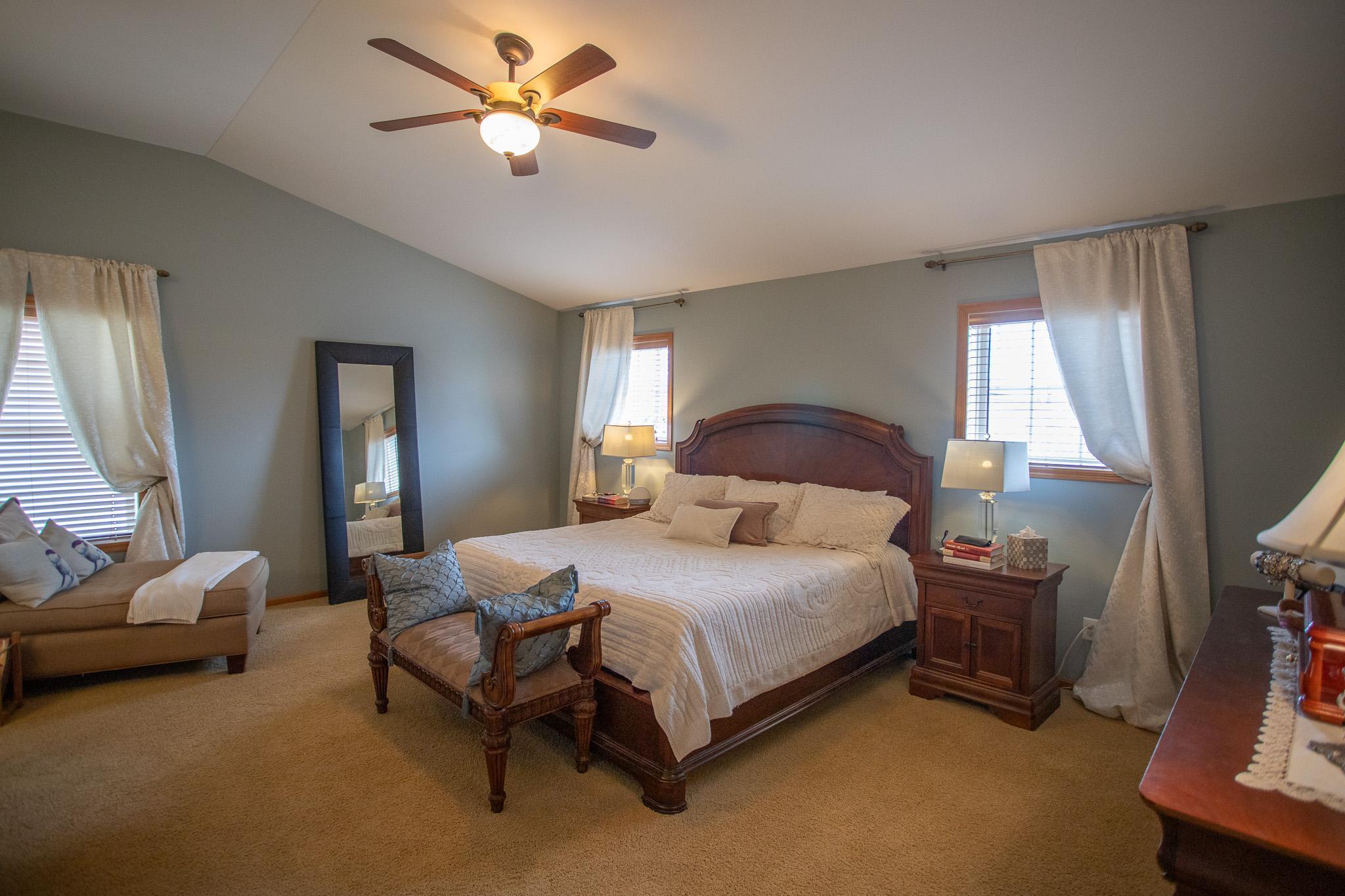 Primary suite with vaulted ceilings