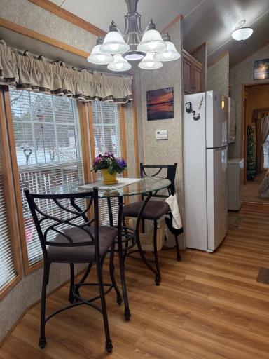 Close up of dining area and bump out bay window