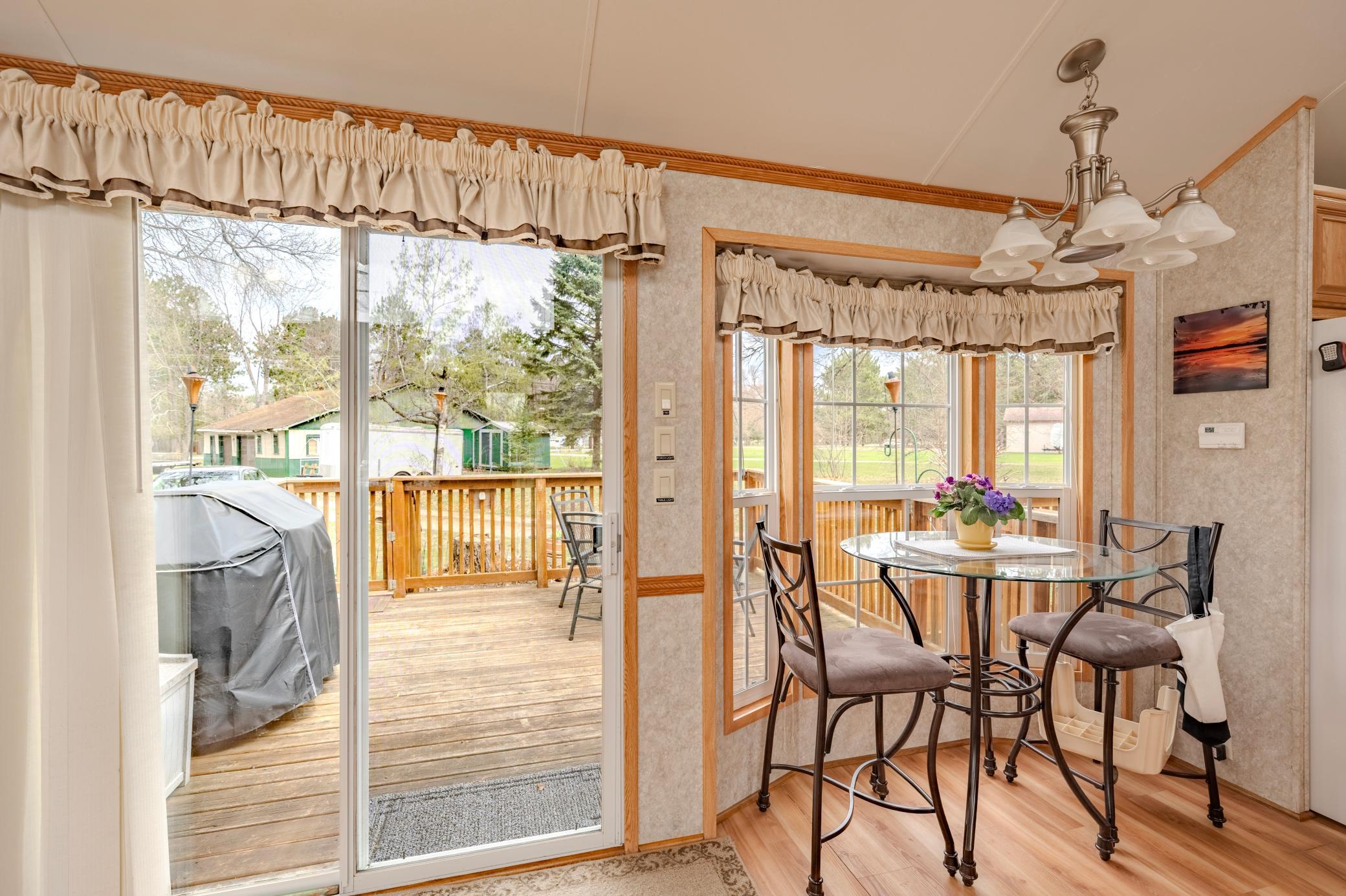 Spacious patio door to deck for grilling convenience.jpg