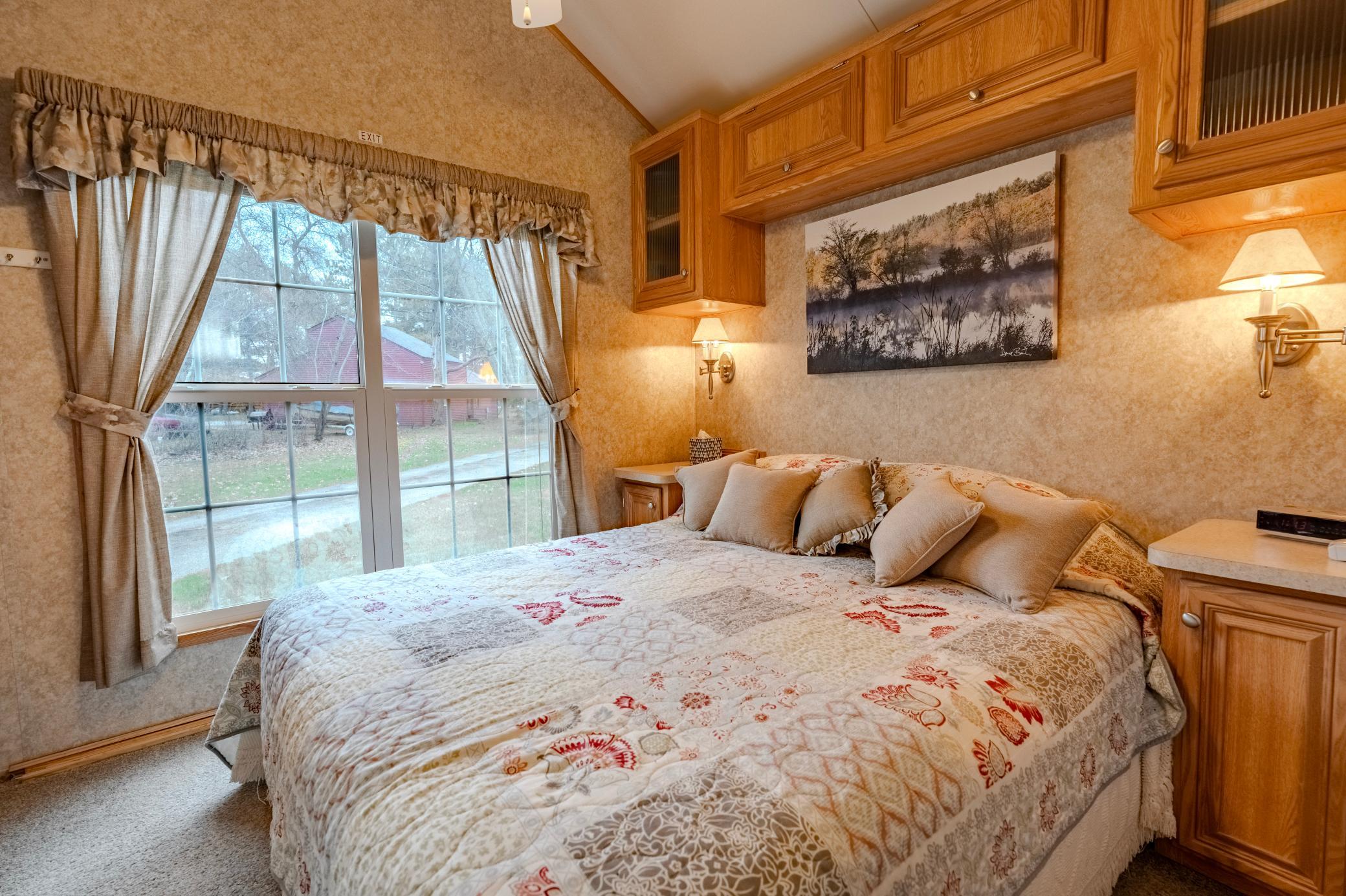 Inside is lovely bedroom with built ins and a closet.jpg