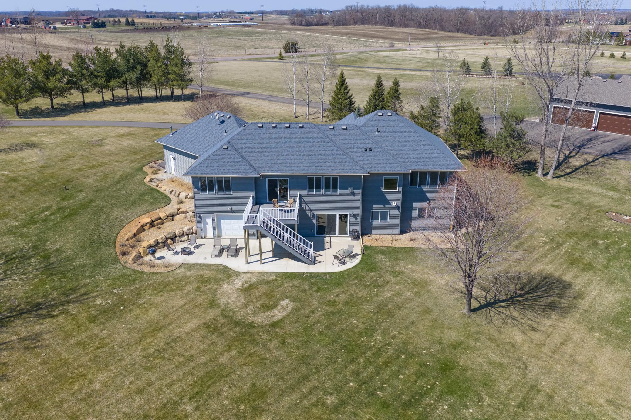 Rear view of the home showcasing the patio & composite Deck