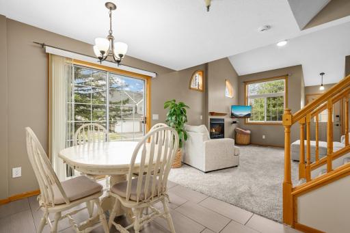 Open and flowing floorplan. Nice tile flooring in kitchen, sliding doors lead to private patio area.