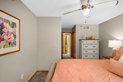 Primary bedroom will accommodate a King sized bed if needed. Large walk in closet too! Ceiling fan to help keep temperatures comfortable!