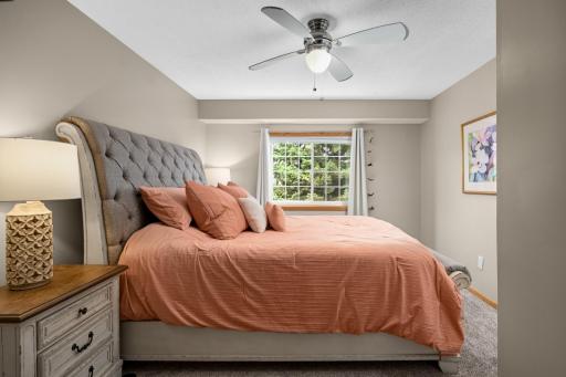 Two bedrooms on upper level, new carpet, new windows & a large walk in closet in the primary bedroom.