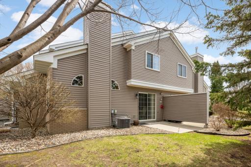 Lots of green space next to the home. New AC unit! Windows in home (other than sliding door and small windows by fireplace) have all been replaced.