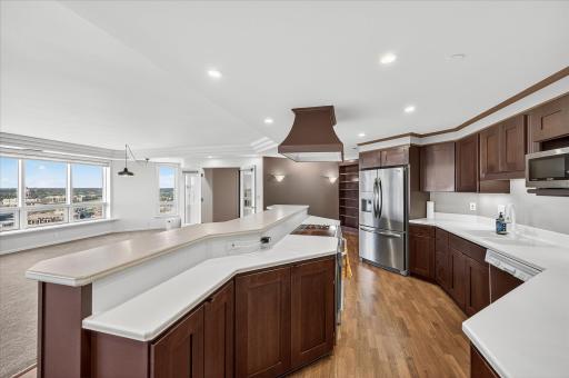 The beautiful kitchen is fully open for entertaining and to enjoy the views. Higher countertop adds great privacy to your cooking and clean up.