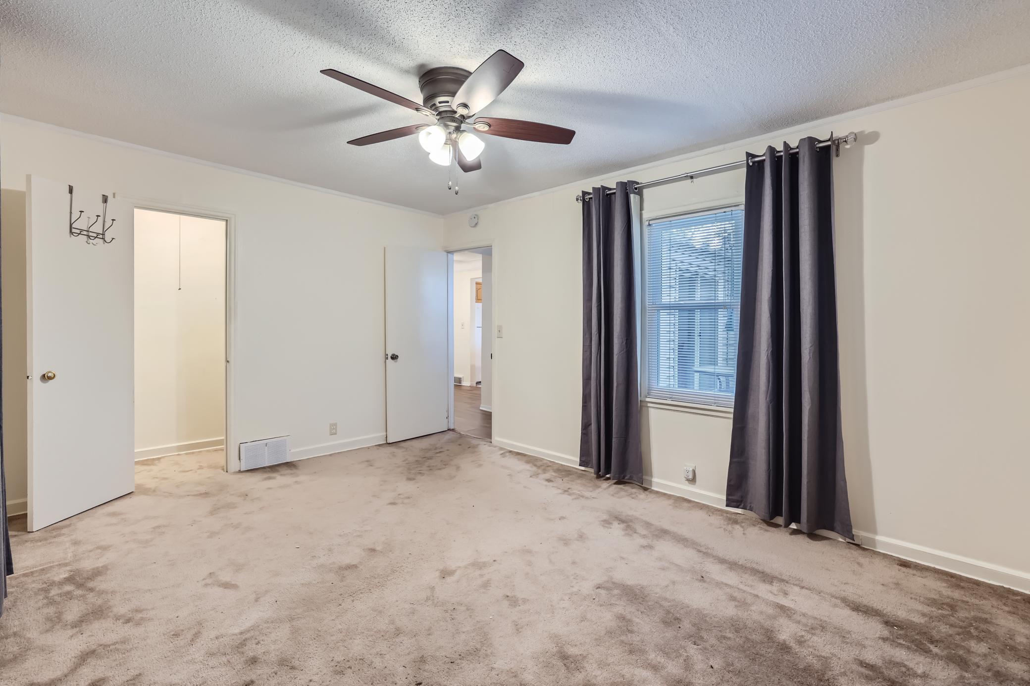 11 Main Floor Primary Bedroom.jpg