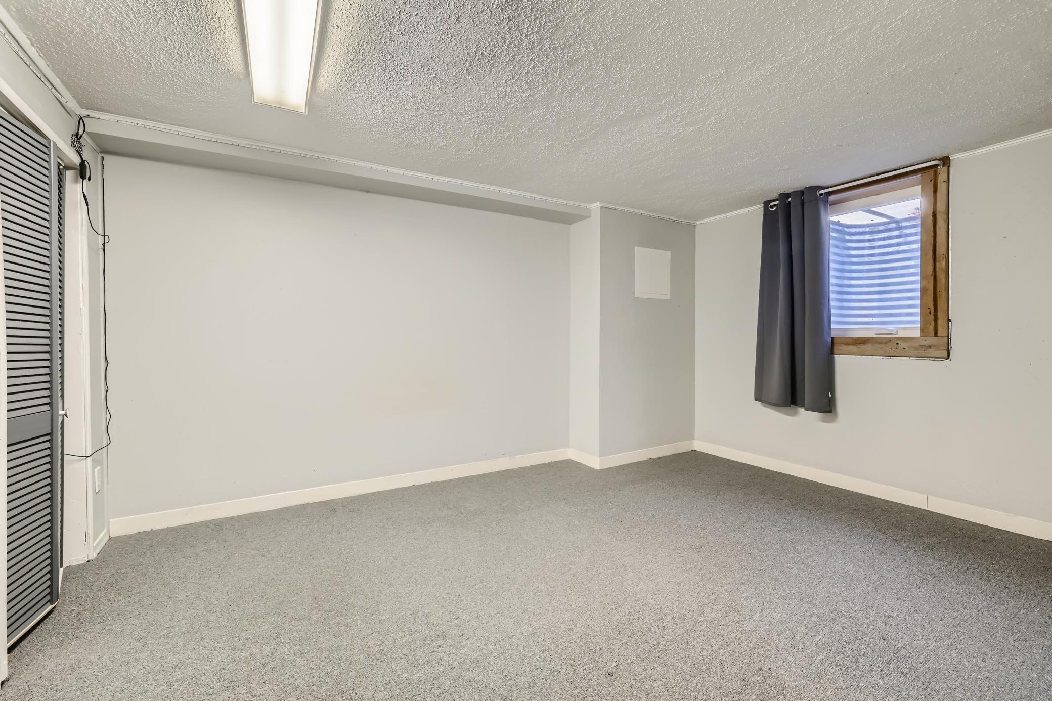 19 Lower Level Bedroom 4.jpg